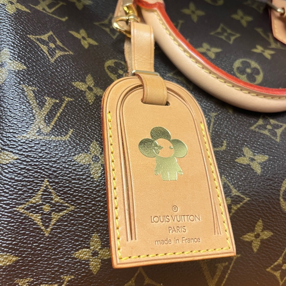Louis Vuitton Embossed Luggage Tag